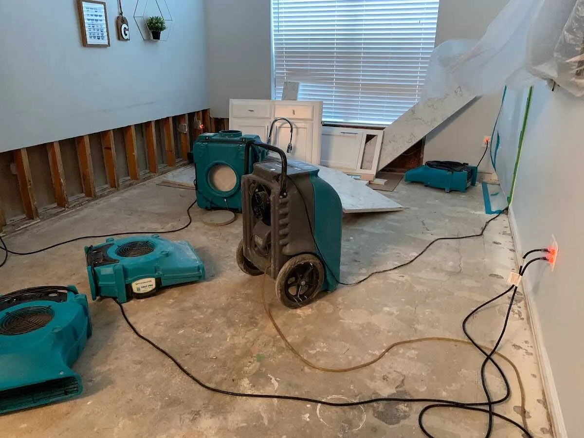 Dehumidifier in flood-cut room for Water Damage Restoration in Sidney